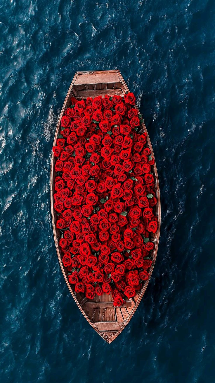 Rose-Filled Boat on the Ocean Poster Wall Art